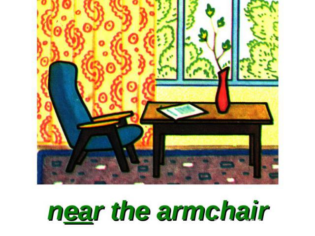 near the armchair