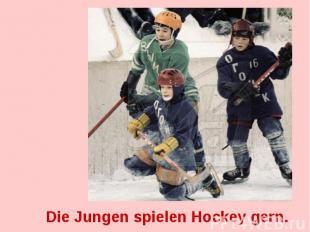 Die Jungen spielen Hockey gern.