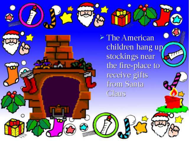 The American children hang up stockings near the fire-place to receive gifts from Santa Claus The American children hang up stockings near the fire-place to receive gifts from Santa Claus